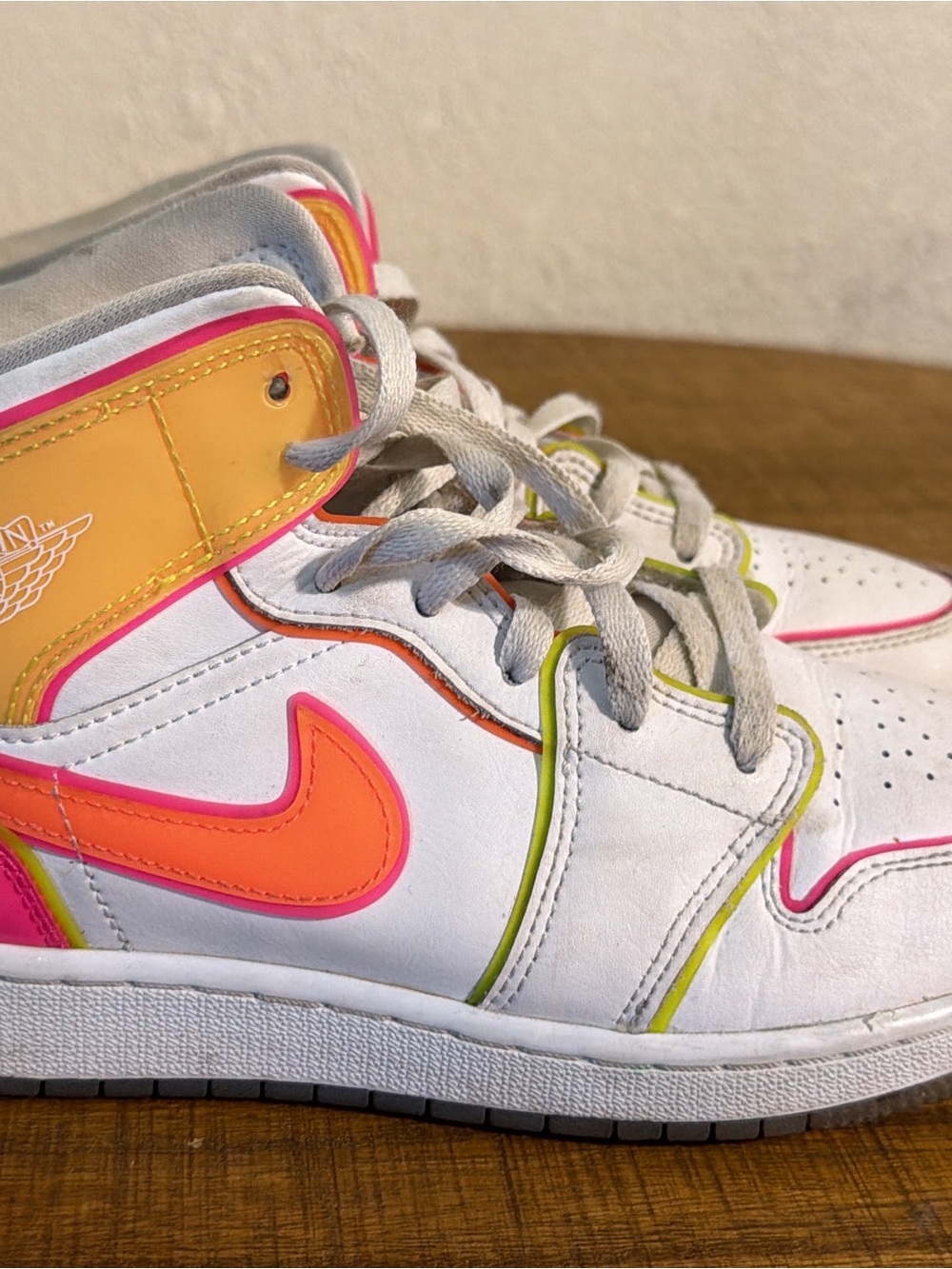 Nike Kids White High-Top Sneakers with Neon Pink and Orange Accents